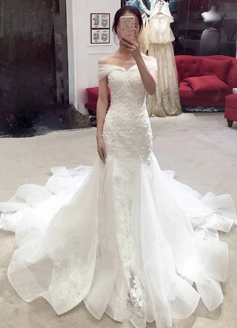 Sheath/column Sleeveless Off-the-shoulder Chapel Train Tulle Wedding Dress With Lace Appliqued