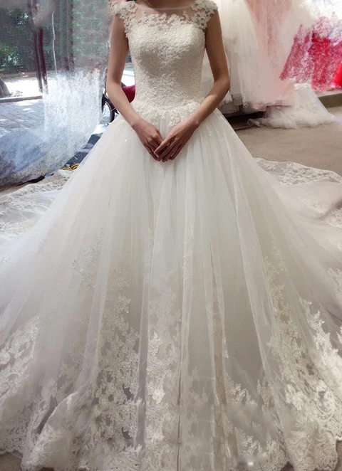 Ball-gown/princess Illusion Sleeveless Cathedral Train Tulle Wedding Dress With Appliqued Lace